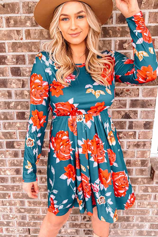 woman wearing Floral Long Sleeve Pleated Detail Dress from Parnova.Store