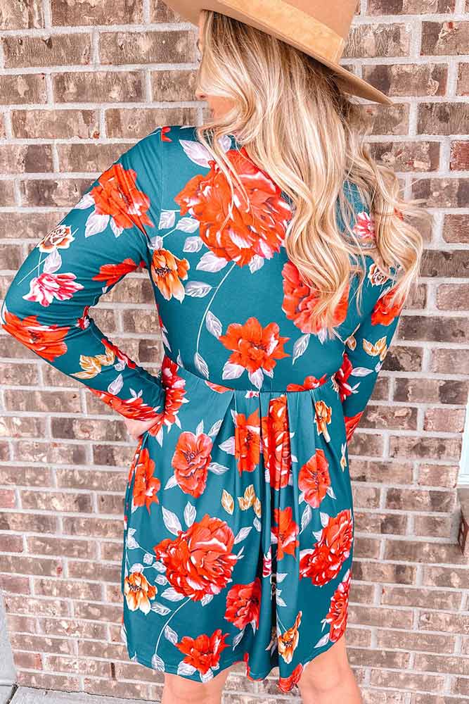 woman wearing Floral Long Sleeve Pleated Detail Dress from Parnova.Store