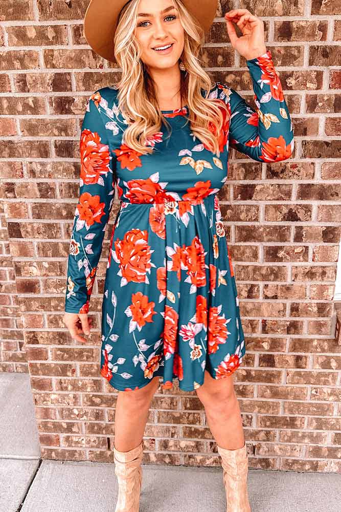 woman wearing Floral Long Sleeve Pleated Detail Dress from Parnova.Store