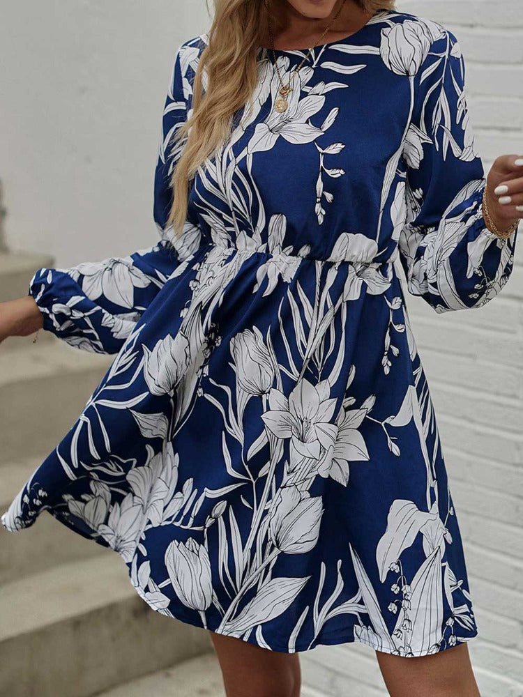 Woman wearing floral round neck long sleeve mini dress from Parnovs Store