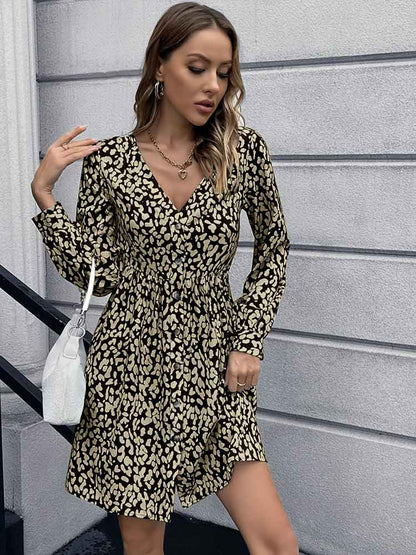 Woman wearing Animal Print Buttoned V-Neck Long Sleeve Black Dress from Parnov.Store