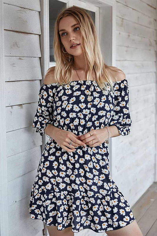 woman wearing dainty daisy off the shoulder navy dress from Parnova.Store